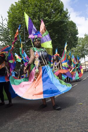 Performer from the Sunshine International float at the Notting Hill Carnival August 30th 2010 in Notting Hill, London.のeditorial素材