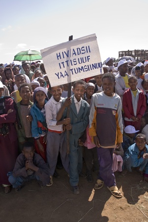 Children holding an HIV banner at the 20th World Aids Day event in Fitche, Ethiopiaのeditorial素材