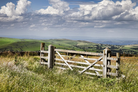 Countryside gate with a wonderful skyの写真素材