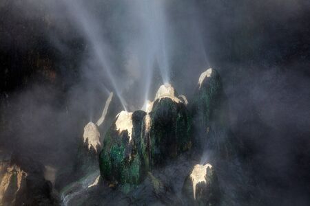 Volcanic Natural Hot Spring in Tengchong, Yunnan Province China. Unusual Volcanic Landscape, Boiling Water Jets Spraying from Natural Rock Formations, Chinese Attraction in Eastern Asia.の写真素材