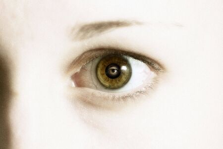 Close up shot of a girl's eye with eye in reflection