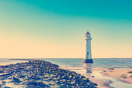 VINTAGE RETRO PHOTO FILTER EFFECT: New Brighton Perch Rock Light House, Merseyside, Birkenhead, The Wirrel, England, UKの写真素材