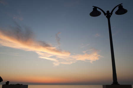 Sunset over the sea at Rodi Garganico (Foggia, Puglia, Italy)の写真素材