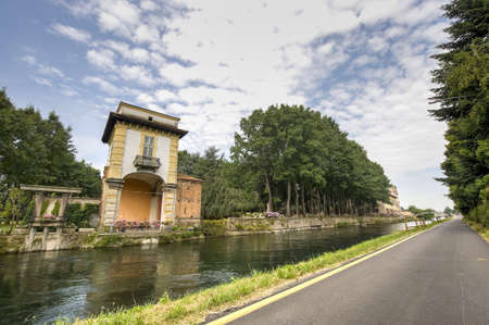 Naviglio Grande (Milan, Lombardy, Italy) - Villa Gaia, ancient palace on the canal and the bicycle laneのeditorial素材