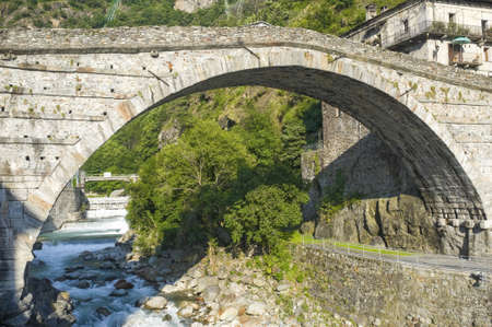 Pont -Saint-Martin (Aosta, Italy) - The Roman bridge over the Lys riverの写真素材