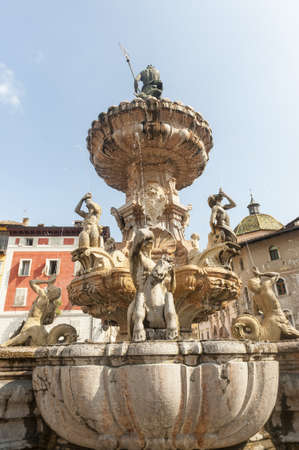 Historic fountain in the cathedral square of Trento (Trentino Alto Adige, Italy)の写真素材
