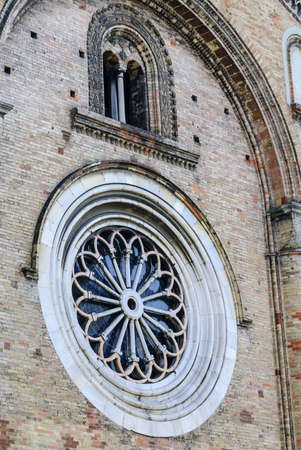 Crema (Cremona, Lombardy, Italy): facade of the cathedral, in Romanesque style, rose window