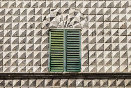Jesi (Ancona, Marches, Italy) - Window with green shutters of a historic palaceの写真素材