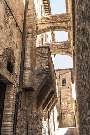 Spello (Perugia, Umbria, Italy) - Typical alley with archesの写真素材