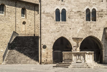 Bevagna (Perugia, Umbria, Italy) - Medieval palace and fountain in Silvestri Squareのeditorial素材