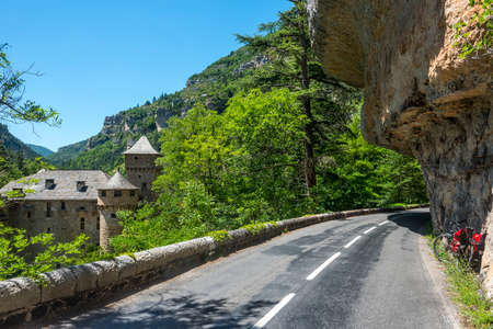 Gorges du Tarn (Lozere, Linguedoc-Roussillon, France), famous canyon at summer: historic castle and bicycleの写真素材