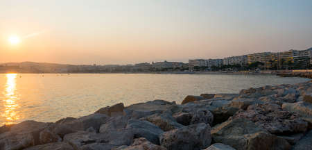 Cannes (Alpes-Maritimes, Provence-Alpes-Cote d'Azur, France): the city and the coast at eveningの写真素材