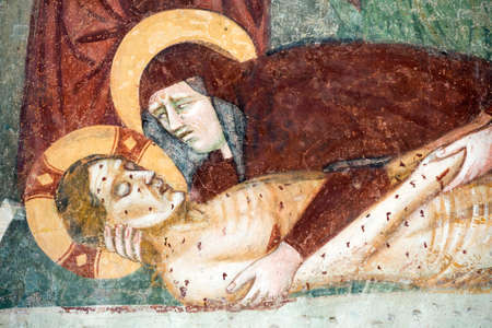 Agliate Brianza (Monza, Lombardy, Italy): interior of the medieval baptistery, in Romanesque style, built in the 10th century: Deposition, painting made by an anonymous medieval painterのeditorial素材