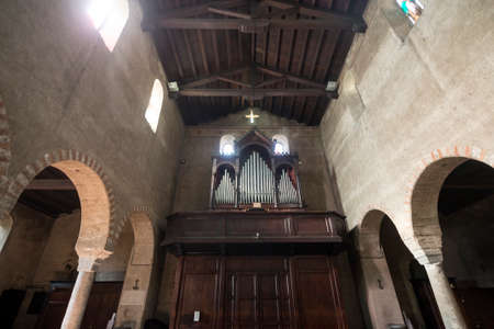 Agliate Brianza (Monza, Lombardy, Italy): interior of the medieval church, in Romanesque style, built in the 10th century: the organのeditorial素材