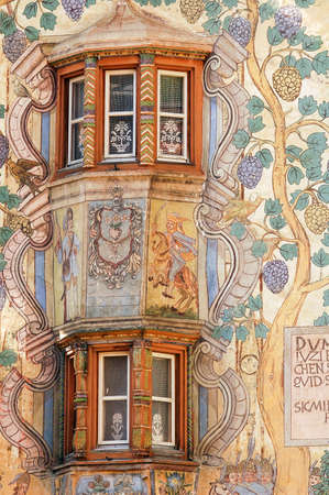 Ardez, typical village in Engadine (Graubunden, Switzerland): Chasa Clalguna, historic house with frescos representing Adam and Eveのeditorial素材