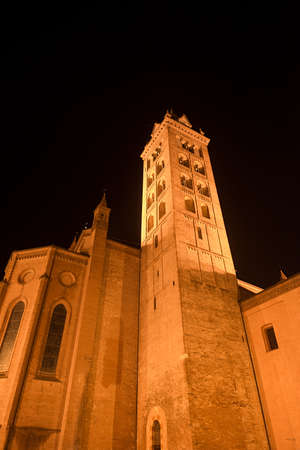 Alba (Cuneo, Piedmont, Italy): belfry of the cathedral at eveningの写真素材