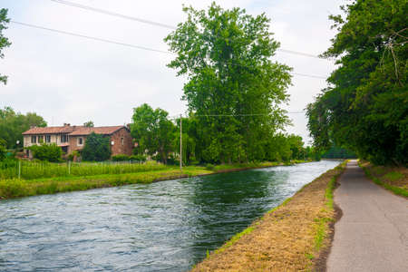 Bicycle lane along the Naviglio Grande, Miln, Lombardy, Italyの写真素材