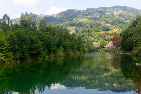 The Serchio river (Lucca, Tuscany, Italy) in a sunny summer morningの写真素材