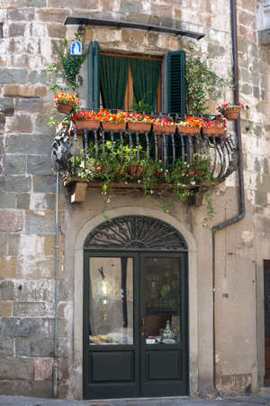 Lucca (Tuscany, Italy), balcony with potted flowersの写真素材