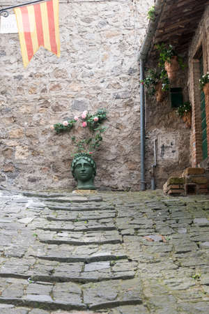 Bolsena (Viterbo, Lazio, Italy): old typical street of the medieval townの写真素材