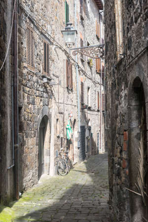 Bolsena (Viterbo, Lazio, Italy): old typical street of the medieval townの写真素材