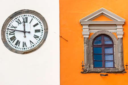 Montefiascone (Viterbo,  Lazio, Italy): old typical buildings: window and clockの写真素材