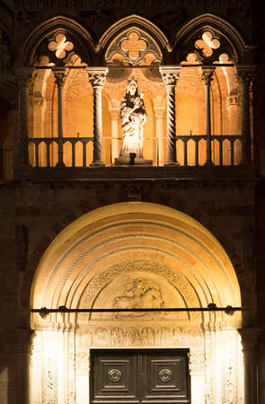 facade of the medieval cathedral at evening