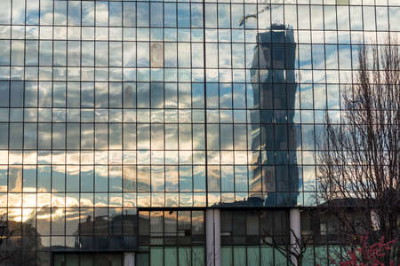 Citylife, modern residential and business buildings in Milan (Lombardy, Italy). Sunset reflectedのeditorial素材