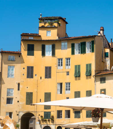 Lucca (Tuscany, Italy), the famous medieval square known as Piazza Anfiteatroのeditorial素材