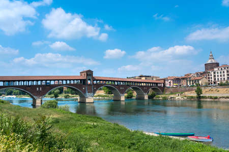Pavia (Lombardy, Italy): the famous covered bridge over the Ticino riverの写真素材