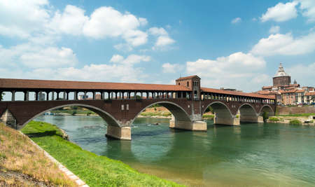 Pavia (Lombardy, Italy): the famous covered bridge over the Ticino riverの写真素材