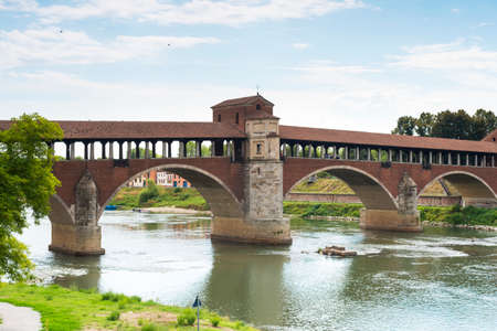 Pavia (Lombardy, Italy): the famous covered bridge over the Ticino riverの写真素材