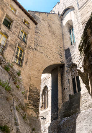 Avignon (Vaucluse, Provence-Alpes-Cote d'Azur, France): old street and Palace of the Popesのeditorial素材