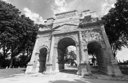 Orange (Vaucluse, Provence-Alpes-Cote d'Azur, France): the Roman Arch. Black and white