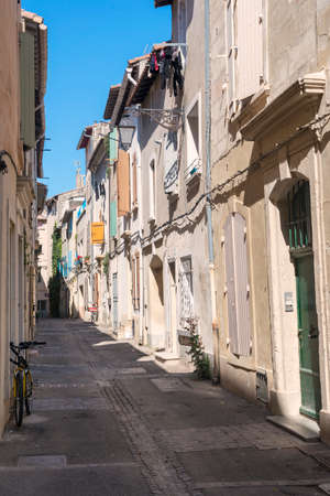 Arles (Bouches-du-Rhone, Provence-Alpes-Cote-d'Azur): typical old streetの写真素材