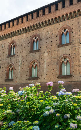 Pavia (Lombardy, Italy): the medieval castle known as Castello Visconteo and hydrangeasのeditorial素材