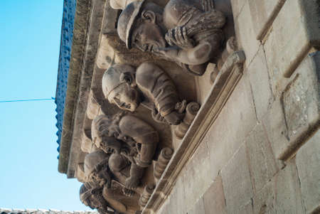 Cervera (Catalunya, Spain): historic palace with grotesque statues