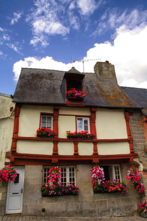 Saint-Brieuc (Cotes-d'Armor, Brittany, France): old typical half-timbered house with flowersの写真素材