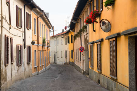 A typical street of Carate Brianza (Monza, Lombardy, Italy) with old housesの写真素材