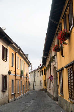 A typical street of Carate Brianza (Monza, Lombardy, Italy) with old housesの写真素材