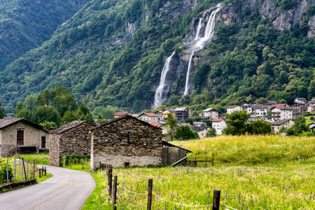 Val Bregaglia (Grigioni, Graubunden, Switzerland) with the bicycle path and the cascade of Acquafraggiaの写真素材