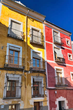 Cuenca (Castilla-La Mancha, Spain), an old typical street with colorful housesのeditorial素材