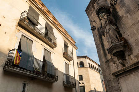 Girona (Gerona, Catalunya, Spain): old typical street and the cathedral in gothic styleのeditorial素材