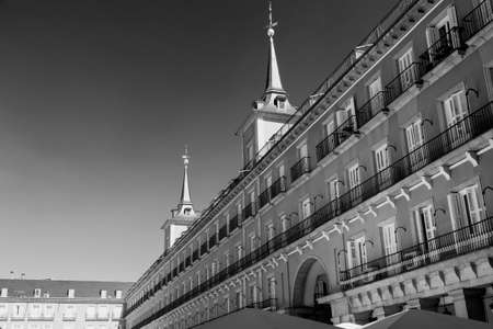 Madrid (Spain): facade of historic buildings in Plaza Mayor, the main square of the city. Black and whiteの写真素材