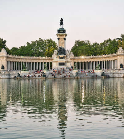 Madrid (Spain): the Park of Buen Retiro at evening. Palace and lake
