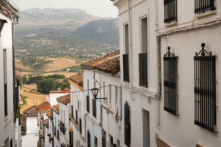 Ronda (Andalucia, Spain): old typical street with white housesの写真素材