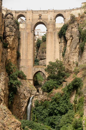 Ronda (Andalucia, Spain): view of the historic city over the canyon, the famous bridgeの写真素材