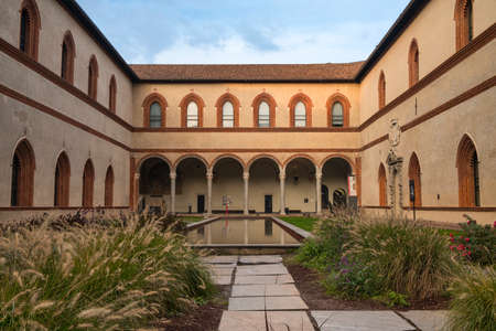 Milan (Lombardy, Italy): the medieval castle, known as Castello Sforzesco: a court with water and porticoのeditorial素材