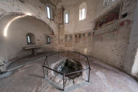 Agliate Brianza (Monza, Lombardy, Italy): interior of the medieval church of Saints Peter and Paul, built from the 11th century, Baptisteryのeditorial素材