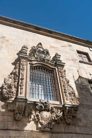 Salamanca (Castilla y Leon, Spain): window of historic palace in baroque styleの写真素材